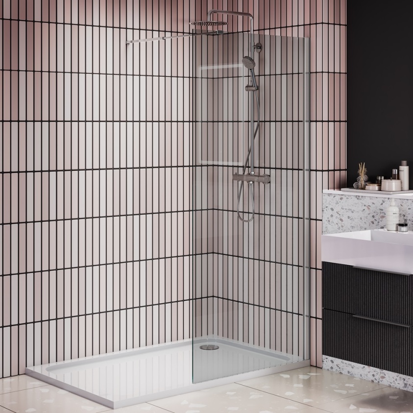 product lifestyle image of 1500mm x 900mm single panel shower enclosure standalone installation in black and white tiled bathroom